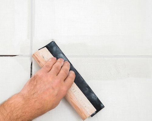 Joint de carrelage appliqué sur carreaux